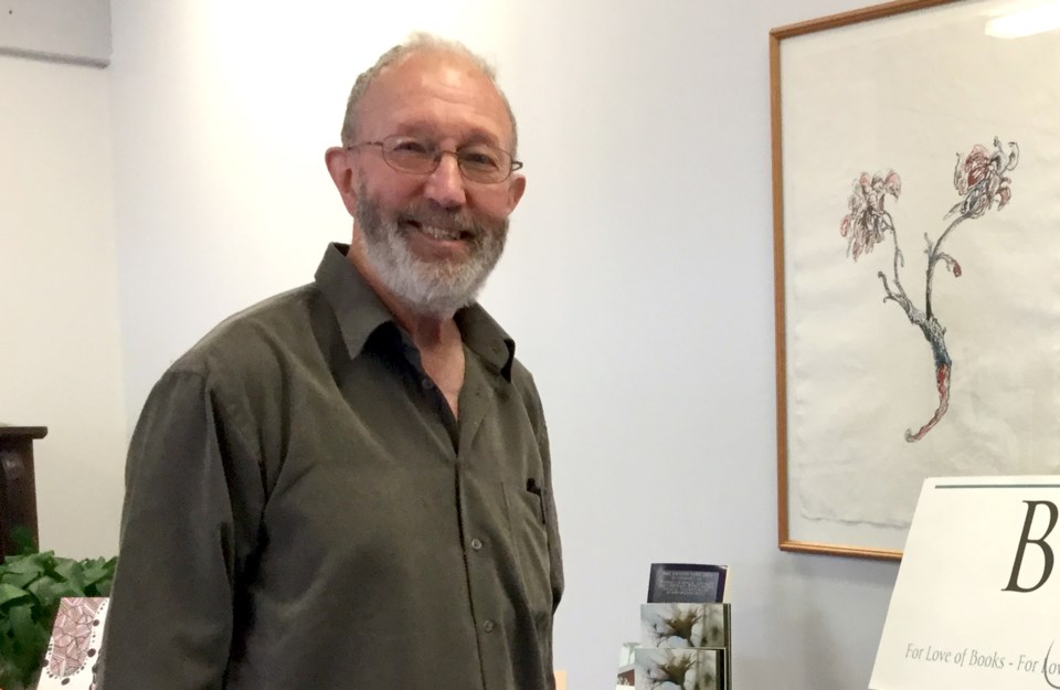 Roger Nash smiling at a bookshop event