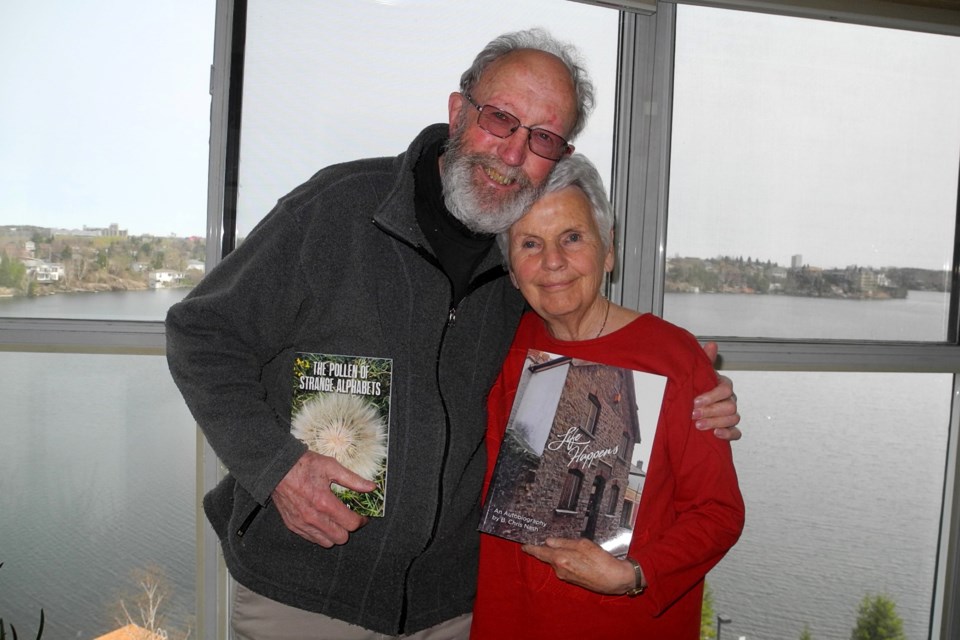 Roger Nash and his wife Chris Nash holding copies of their new books